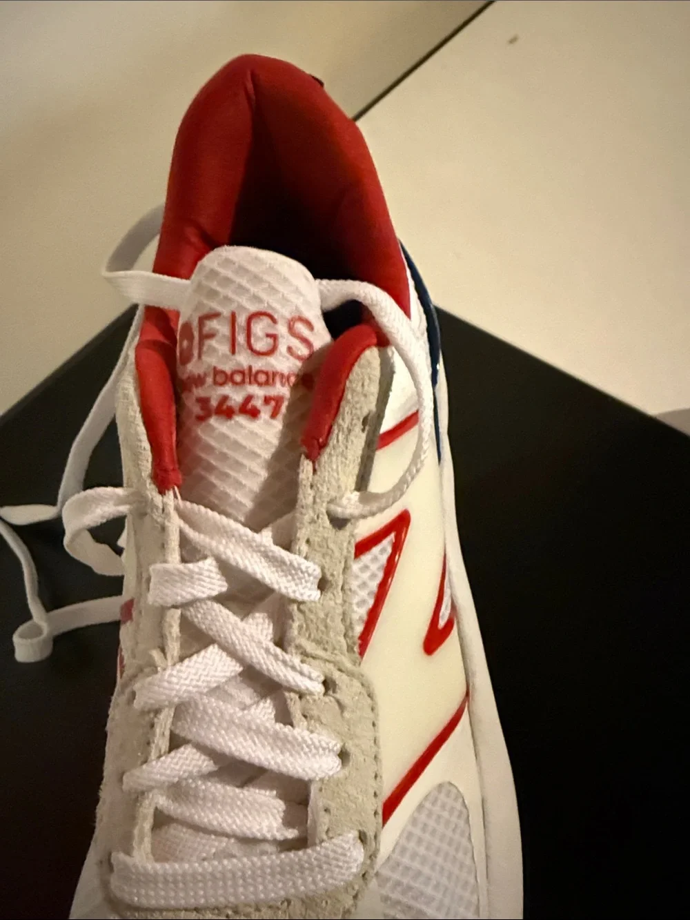 New Balance Kids White Red Blue Sneaker Pair